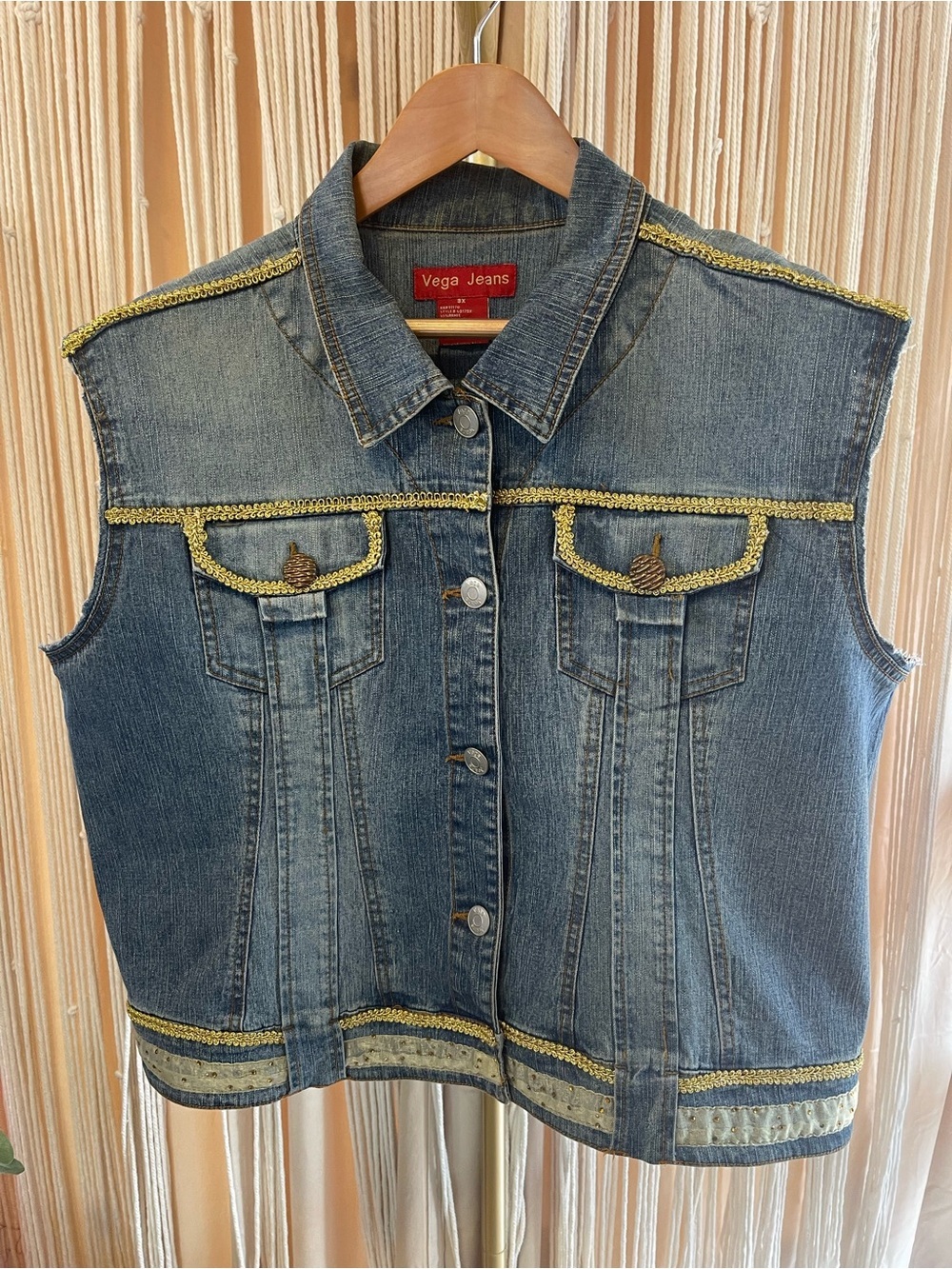 Vega Jeans denim vest featuring gold metallic trim & button closures trucker